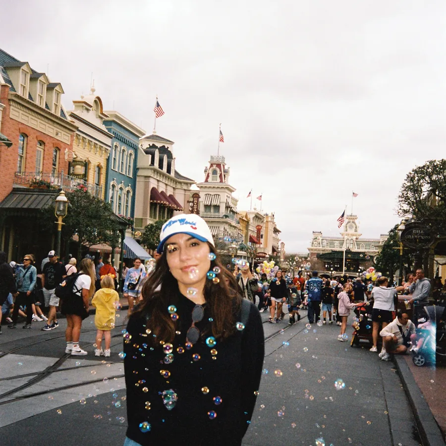 Cloe at a theme park from a February 2026 Instagram carousel
