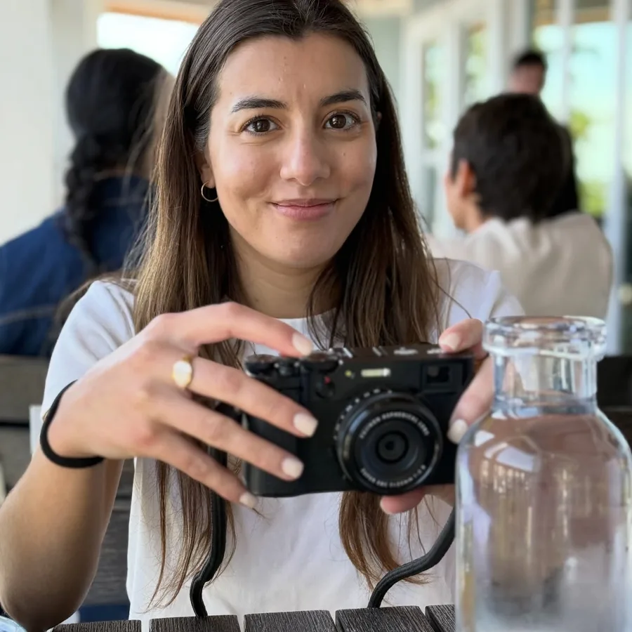 Cloe behind the camera from a January 2026 Instagram carousel