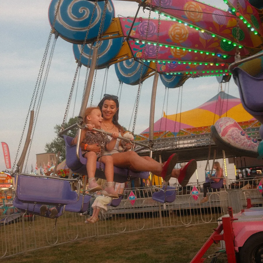 Cloe at a fair from a September 2025 Instagram carousel